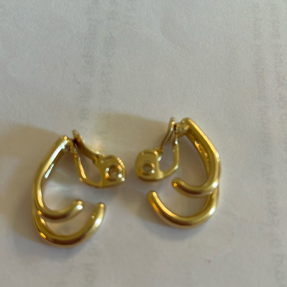 Vintage HMN stamped Clip On gold tone twist open curvy curled under Earrings EUC
